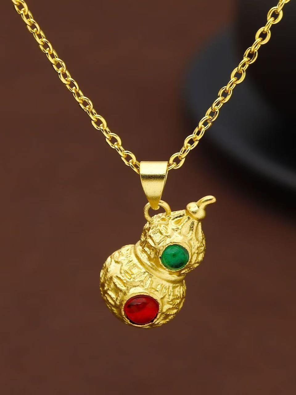 Gold-Inlaid Hotan Jade Gourd Pendant